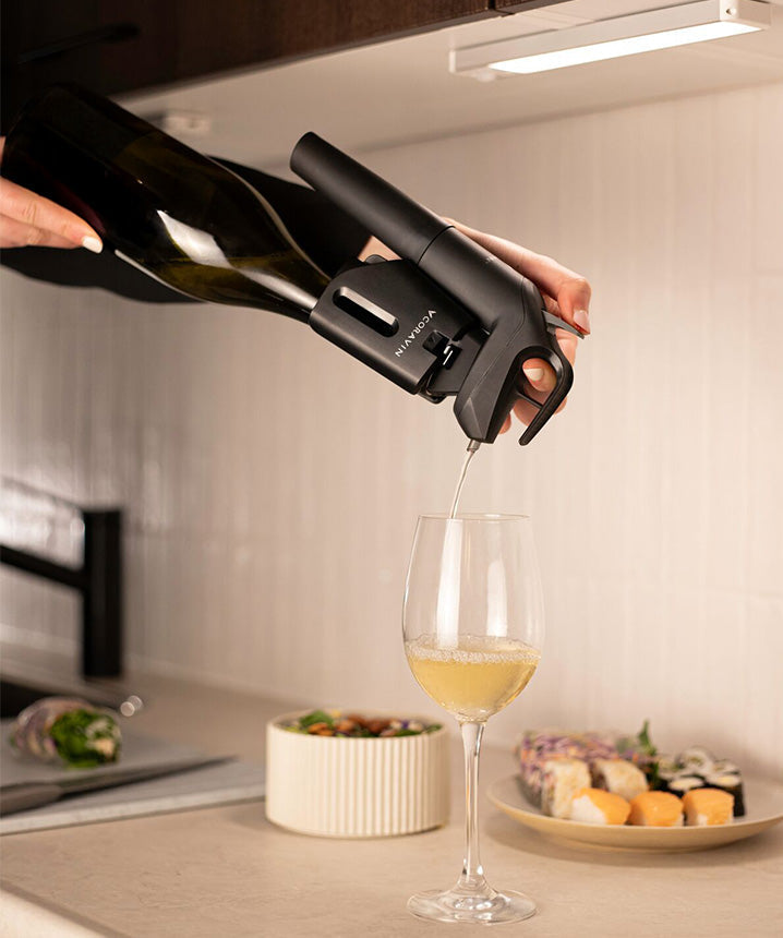 the best wine opener for old corks: coravin timeless pouring white wine with vintage needle