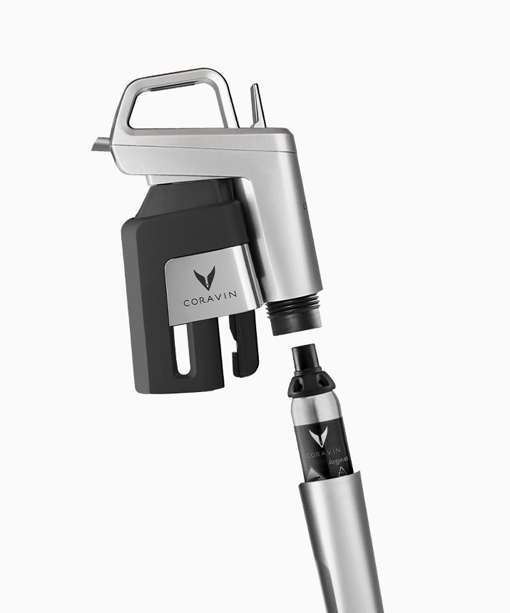 Coravin Silver Timeless Six inserting capsule into cup